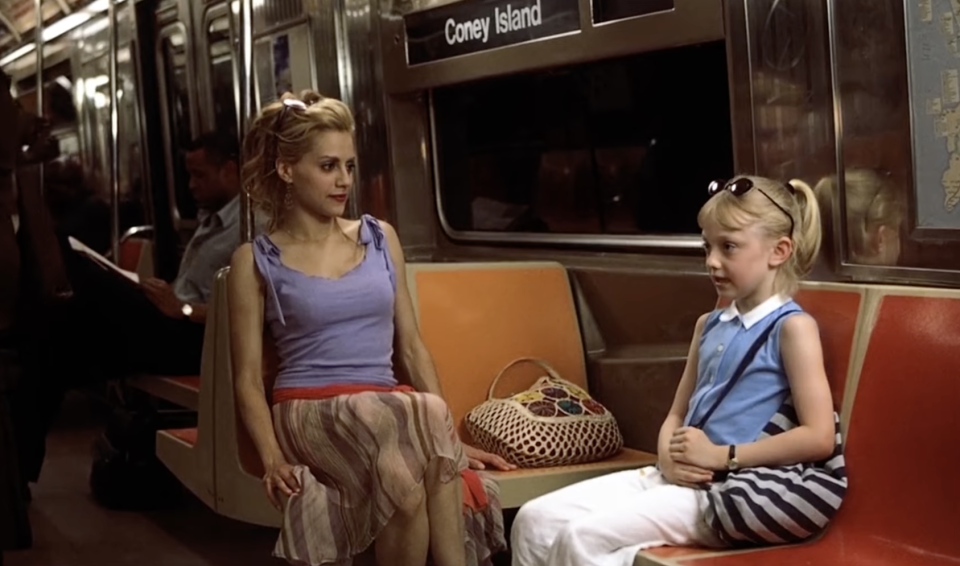 Brittany Murphy and Dakota Fanning as Molly and Ray in "Uptown Girls" are on the subway