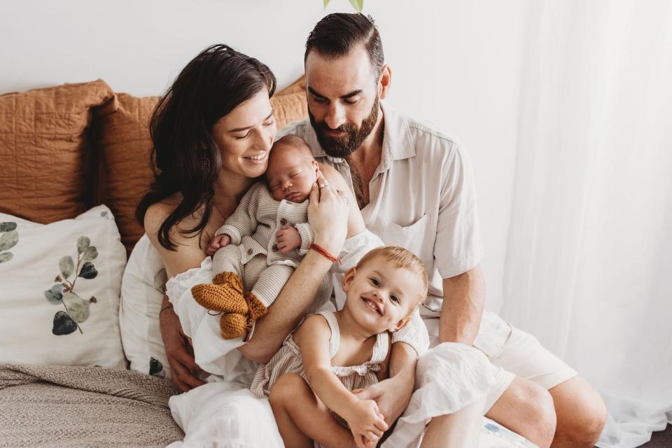 Shannon Laverty with her husband, Kent Ashcroft and their two children, Harper, 1, and newborn Shep. Photo: Mel Dixon Photography (supplied).