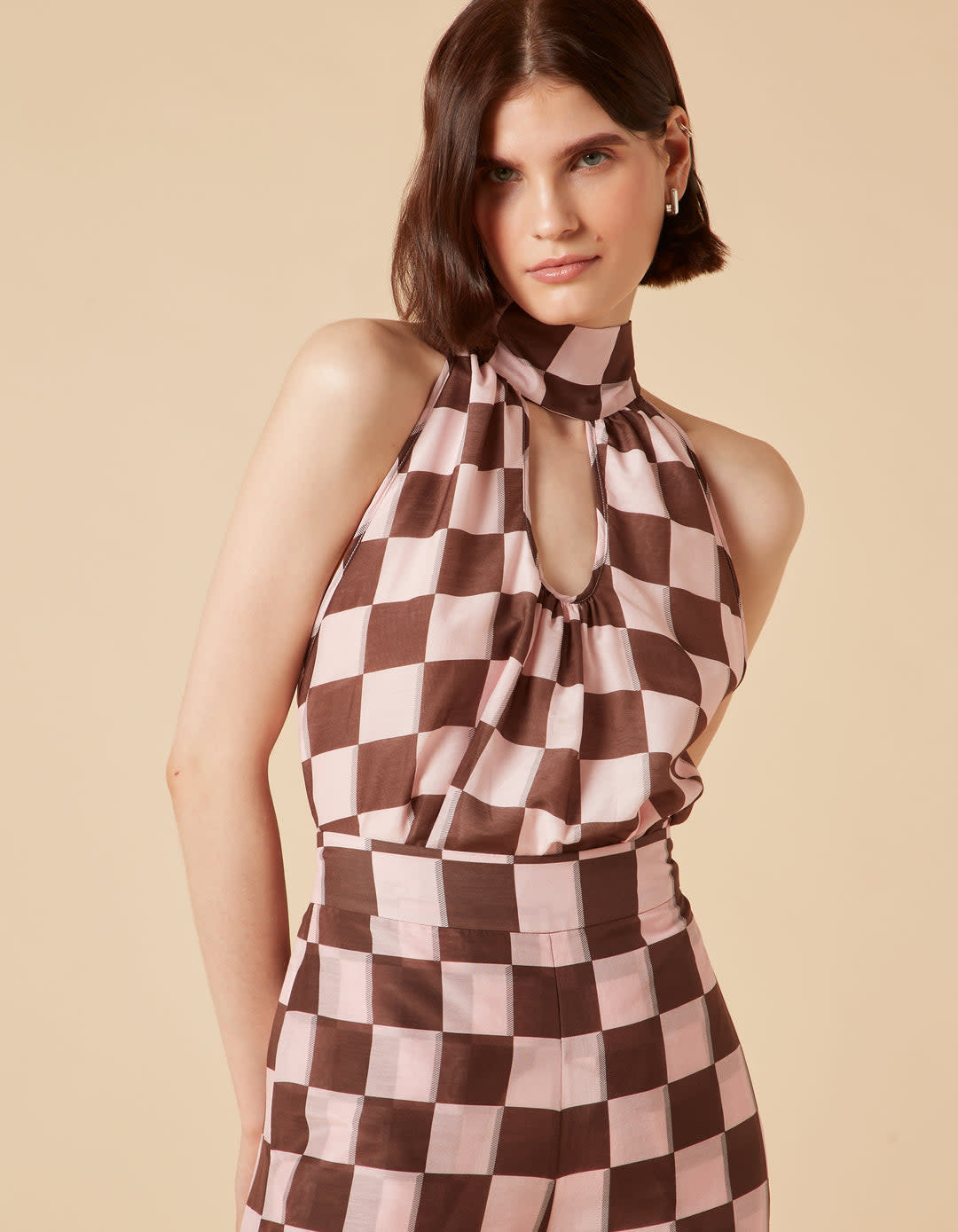 <p><a href="https://lisou.co.uk/collections/emily-in-paris-edit/products/louise-pink-brown-puzzle-silk-voile-top" rel="nofollow noopener" target="_blank" data-ylk="slk:Shop Now;elm:context_link;itc:0;sec:content-canvas" class="link rapid-noclick-resp">Shop Now</a></p> <p>Louise Pink Brown Puzzle Print Silk Voile Top</p> <p>lisou.co.uk</p> <p>£500.00</p>