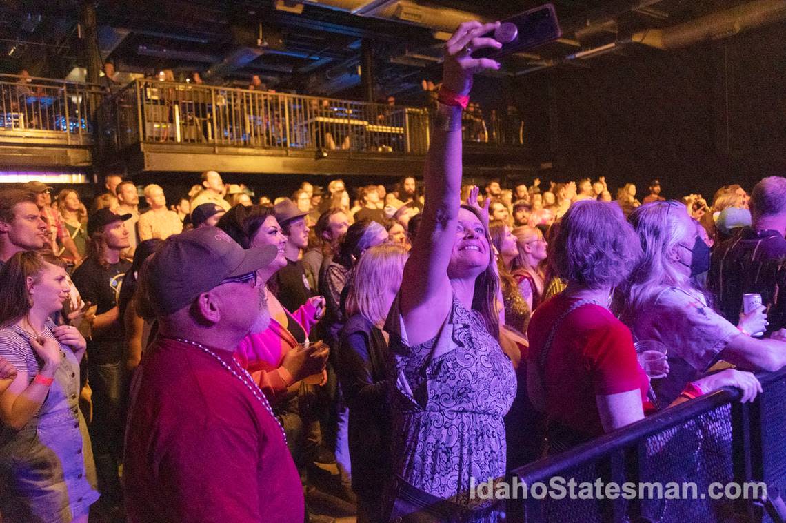 A fan takes a photo at the MarchFourth concert at The Knitting Factory during Treefort on March 24, 2022.