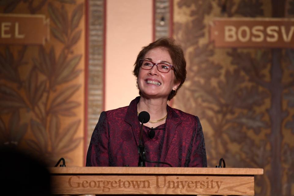 Former Ambassador to Ukraine Marie Yovanovitch looks up at the audience as she speaks at Georgetown University in Washington, Wednesday, Feb. 12, 2020. She was awarded the 2020 J. Raymond "Jit" Trainor Award for Excellence in the Conduct of Diplomacy. (AP Photo/Susan Walsh) ORG XMIT: DCSW129