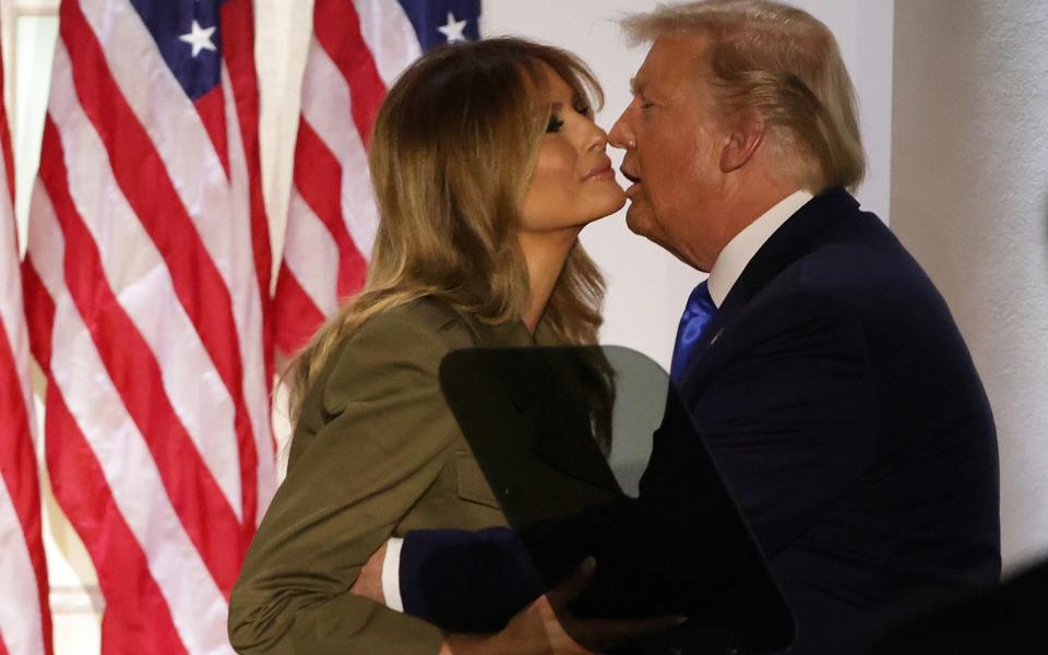 Donald Trump kisses first lady Melania Trump after her address to the Republican National Convention from the Rose Garden - Getty