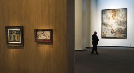 A security personnel walks the third floor galleries after the grand opening and dedication for the new Dali Museum in St. Petersburg, Florida,in this January 11, 2011 file photo. REUTERS/Steve Nesius