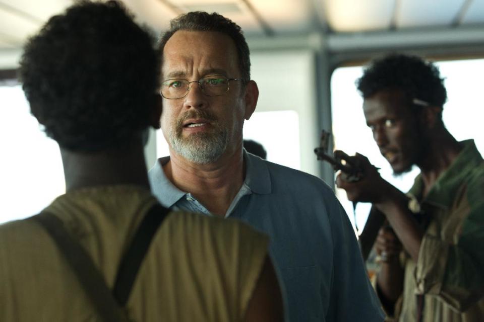 This film image released by Sony - Columbia Pictures shows Tom Hanks, center, in a scene from "Captain Phillips." The film was nominated for a Directors Guild award on Tuesday, Jan. 7, 2014. The winners will be announced on Jan. 25. (AP Photo/Sony - Columbia Pictures)