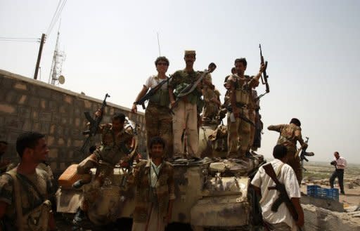 Yemeni soldiers celebrate in the southern city of Jaar in June 2012 after ousting Al-Qaeda militants. Yemeni troops killed the second in command of Al-Qaeda in the Arabian Peninsula, regarded by Washington as the jihadist network's deadliest branch, in a raid in the east, the defence ministry news website said on Monday