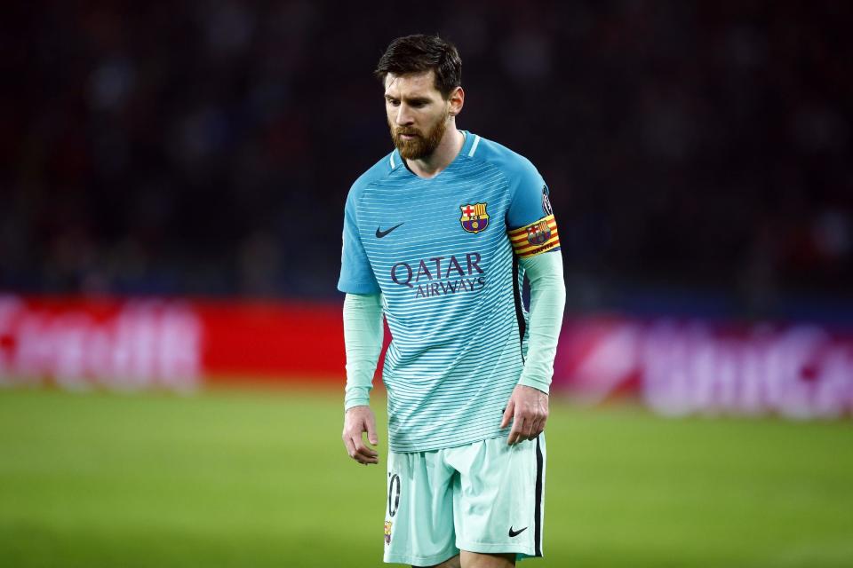 Barcelona's Lionel Messi looks on duringVthe Champion's League round of 16, first leg soccer match between Paris Saint Germain and Barcelona at the Parc des Princes stadium in Paris, Tuesday, Feb. 14, 2017. PSG won the match 4-0. (AP Photo/Francois Mori)