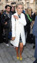 <b>London Fashion Week AW13 FROW</b><br><br>Mollie Sims stepped out in a white trench coat and lime green heels.<br><br>© Rex