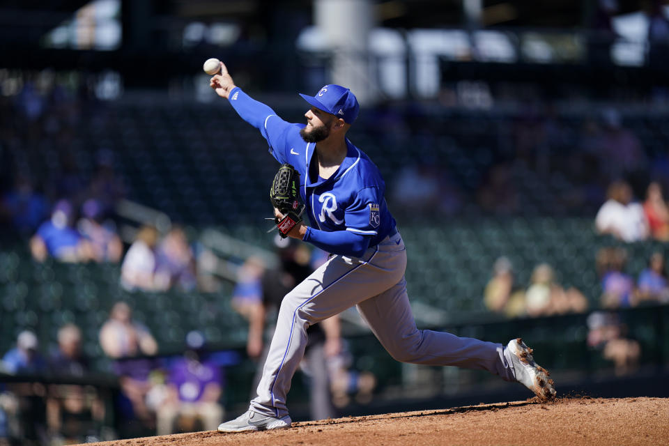Kansas City Royals starting pitcher Jakob Junis throws against the Chicago Cubs during the first inning of a spring baseball game in Mesa, Ariz., Tuesday, March 2, 2021. (AP Photo/Jae C. Hong)