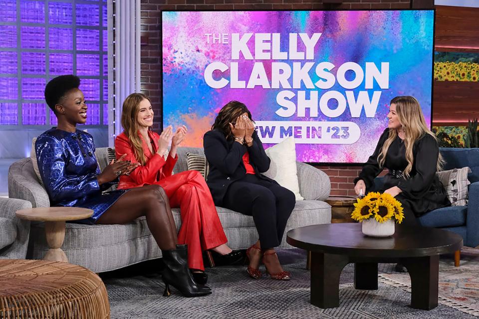 This photo provided by "The Kelly Clarkson Show," features (left to right) Folake Olowofoyeku, Allison Williams and Betty Henderson. Henderson, a child care operator from Detroit, reacts as she finds out she received a $20,000 gift from Clarkson. She would also get thousands more from Detroit readers following a Detroit Free Press article.