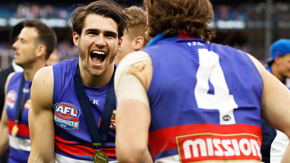 Easton Wood, pictured here celebrating with Marcus Bontempelli after the Bulldogs' triumph in 2016.