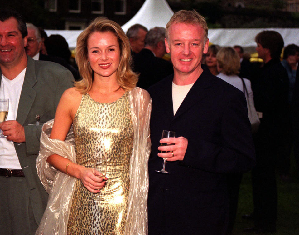 Actress Amanda Holden & husband, comedian and television presenter Les Dennis at the Carlton Television, Parliamentary Summer reception at College Garden, Westminster Abbey.   (Photo by Ian Nicholson - PA Images/PA Images via Getty Images)