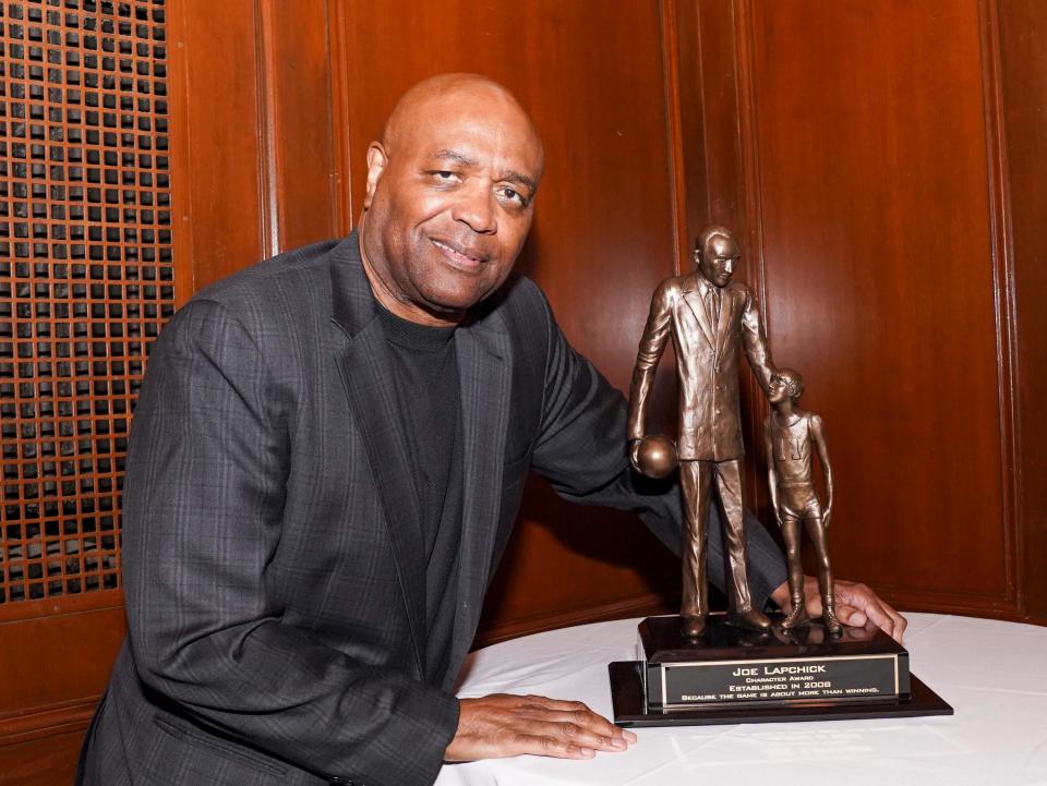 Florida State men's basketball coach Leonard Hamilton poses for a picture with the Joe Lapchick Character Award in New York City on Sept. 16, 2022.