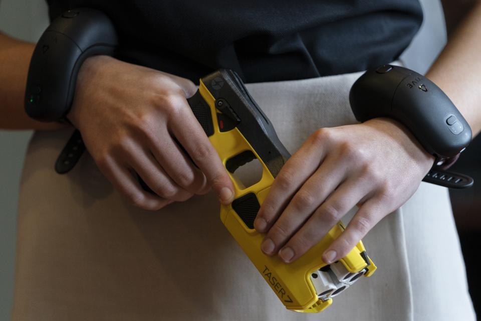 VR equipment and a version of the TASER 7 that utilizes VR technology for training, is demonstrated, Thursday, May 12, 2022, in Washington. (AP Photo/Jacquelyn Martin)