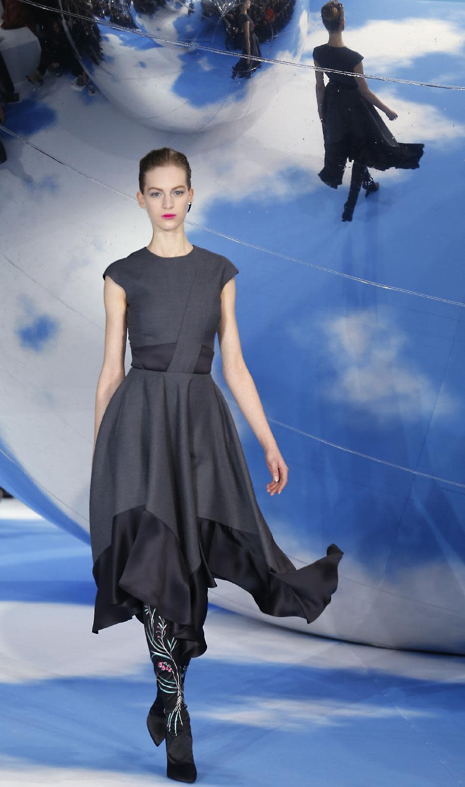 A model wears a creation by designer Raf Simons for Christian Dior's Ready to Wear Fall-Winter 2013-2014 fashion collection, presented, Thursday, March.1, 2013 in Paris. (AP Photo/Jacques Brinon)