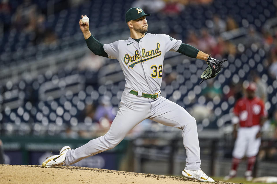 Oakland Athletics starting pitcher James Kaprielian throws during the third inning of a baseball game against the Washington Nationals at Nationals Park, Wednesday, Aug. 31, 2022, in Washington. (AP Photo/Alex Brandon)