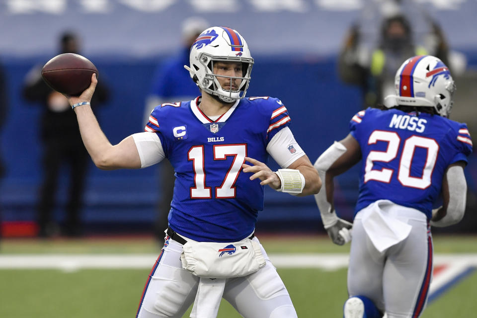 Buffalo Bills quarterback Josh Allen passes in the first half of an NFL football game against the Miami Dolphins, Sunday, Jan. 3, 2021, in Orchard Park, N.Y. (AP Photo/Adrian Kraus)