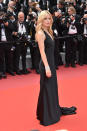 <p>Model Georgia May Jagger kept it simple on the red carpet in a low-backed, black gown with a small train. (Photo: Getty) </p>