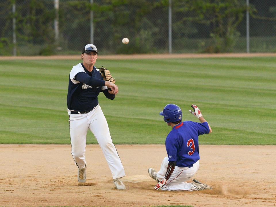 Luxemburg turns a double play against St. Joseph in the Region 11C Tournament Friday, Aug. 7, 2020, at St. Cloud Orthopedics Field in Sartell.