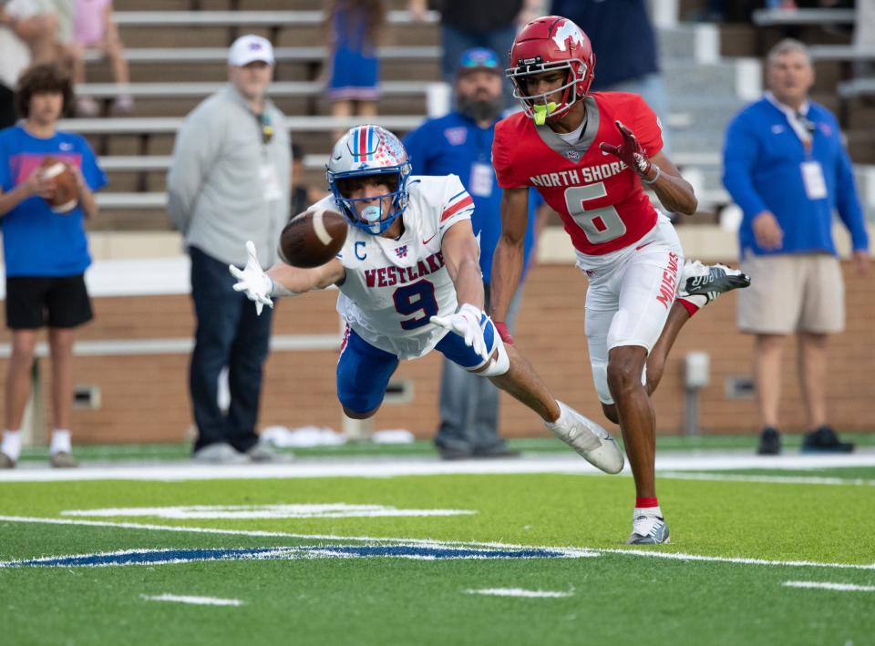 North Shore defensive back Devin Sanchez is called for pass interference on Westlake receiver Jaden Greathouse.