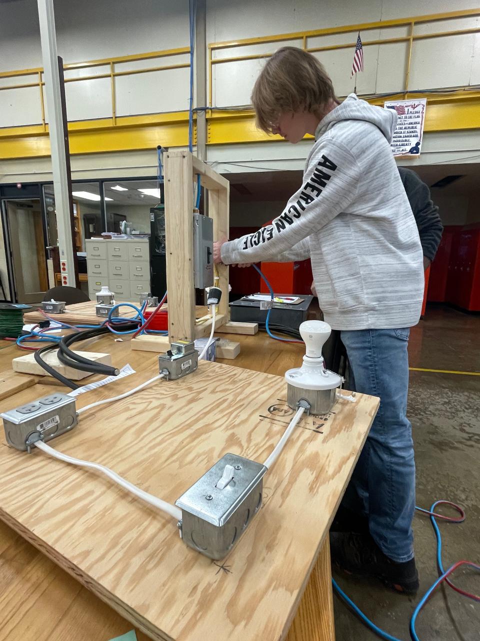 A student works on wiring in the electrical systems technology program at the Coshocton County Career Center. The program started this  year with 15 students and 26 students are slated to take the program next year.