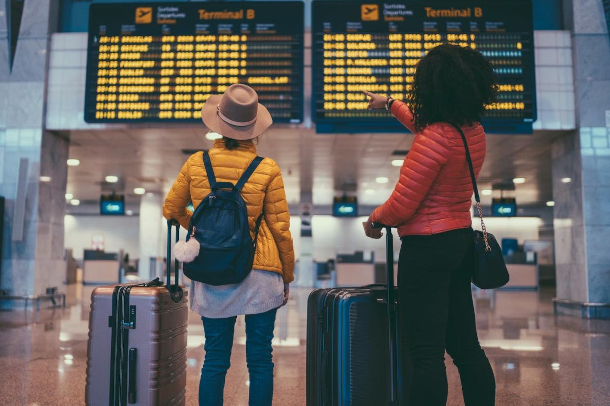 A boom time for airlines can a bust for loyal passengers. <a href="https://www.gettyimages.com/detail/photo/friends-at-the-international-airport-in-barcelona-royalty-free-image/1009031554" rel="nofollow noopener" target="_blank" data-ylk="slk:Martin-dm/E+/Getty Images;elm:context_link;itc:0;sec:content-canvas" class="link ">Martin-dm/E+/Getty Images</a>