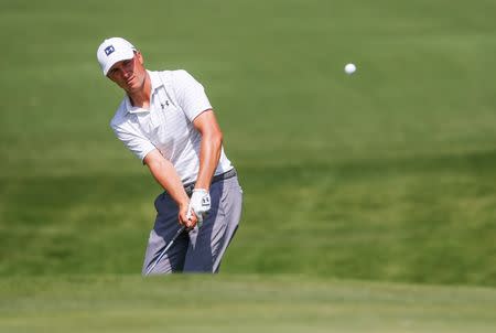 May 25, 2019; Fort Worth, TX, USA; Jordan Spieth chips on to the 17th green during the third round the Charles Schwab Challenge golf tournament at Colonial Country Club. Mandatory Credit: Ray Carlin-USA TODAY Sports