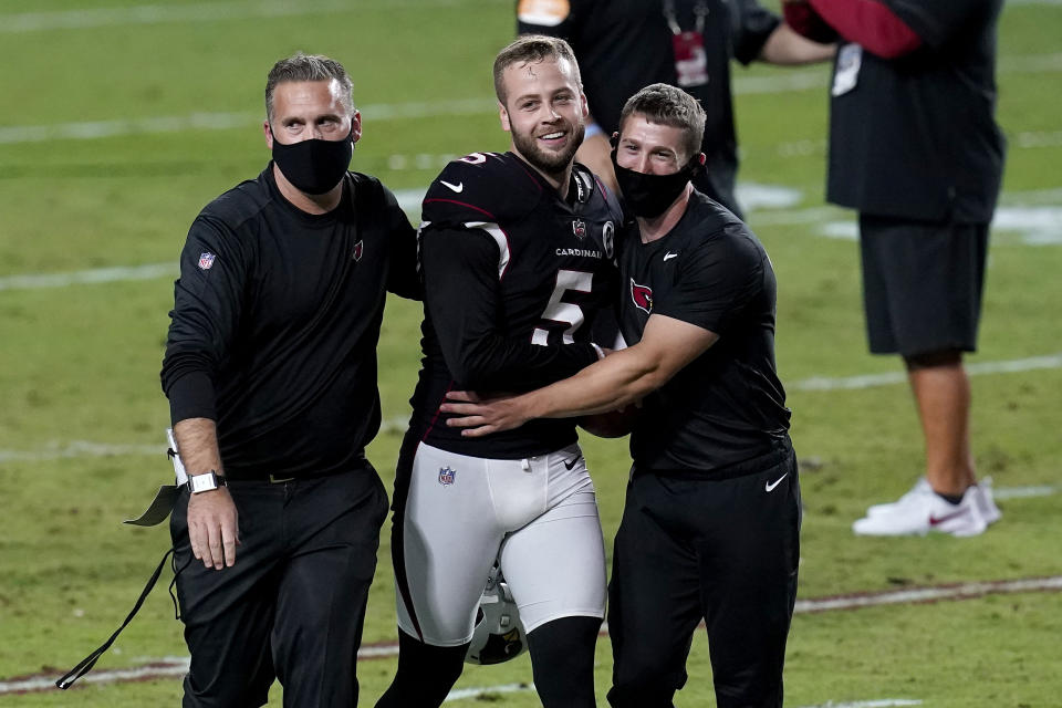 Arizona Cardinals kicker Zane Gonzalez (5) leaves the field after an NFL football game against the Seattle Seahawks, Sunday, Oct. 25, 2020, in Glendale, Ariz. The Cardinals won 37-34 in overtime. (AP Photo/Ross D. Franklin)