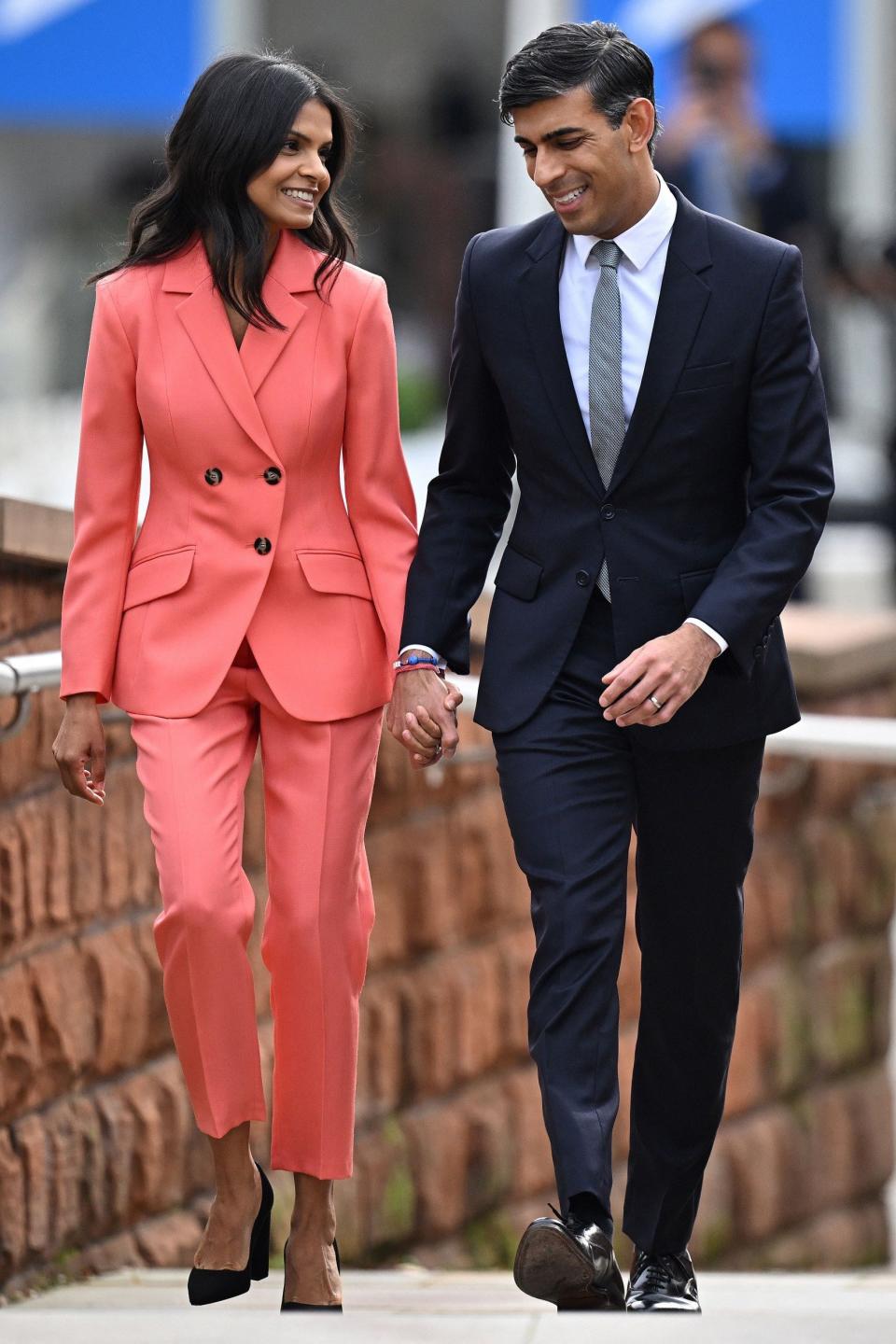 Akshata Murty, wore The Fold’s coral Esme trousers