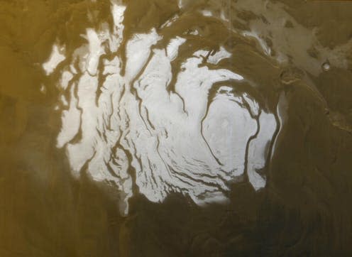 <span class="caption">The south polar cap of Mars is hiding a subsurface lake, according to new research. </span> <span class="attribution"><span class="source">NASA/JPL/MSSS</span></span>