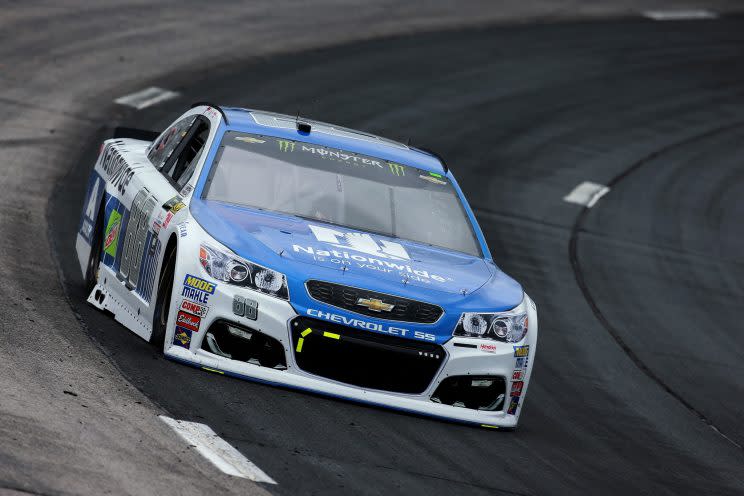 Dale Earnhardt Jr. drives through the top groove application of traction compound Friday. (Getty)
