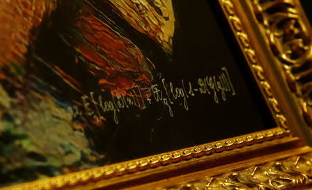 The signature of the team of French entrepreneurs called Obvious is seen on the artwork "La Comtesse de Belamy" (2018), created by the Generative Adversarial Network (GAN), an algorithm that learns to generate new images by being fed a database of existing paintings, during an interview with Reuters in Paris, France, September 21, 2018. REUTERS/Christian Hartmann NO RESALES. NO ARCHIVES