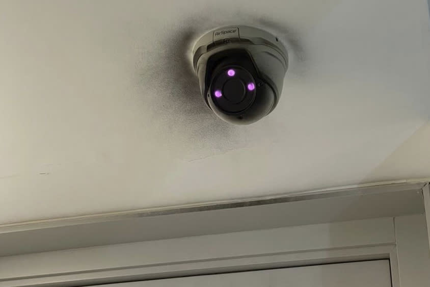 This undated image provided by Sanna Rameau, shows paint obscuring a building's security camera where Ana Maria Knezevic was staying in Madrid. Spanish police are searching for Knezevic, a Colombian-American woman who went missing suddenly in Madrid. (Sanna Rameau via AP)