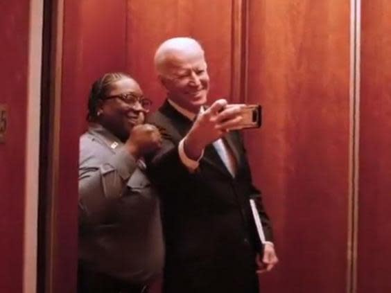 Joe Biden takes a selfie with an elevator operator on his way to a meeting with The New York Times' editorial board (FX)