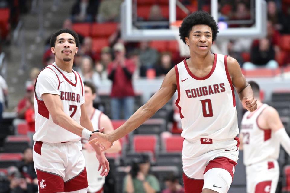 Washington State Cougars forward Jaylen Wells (0) celebrates a 3-pointer during a game against the Utah Utes in the second half Jan. 24, 2024, in Pullman, Washington.