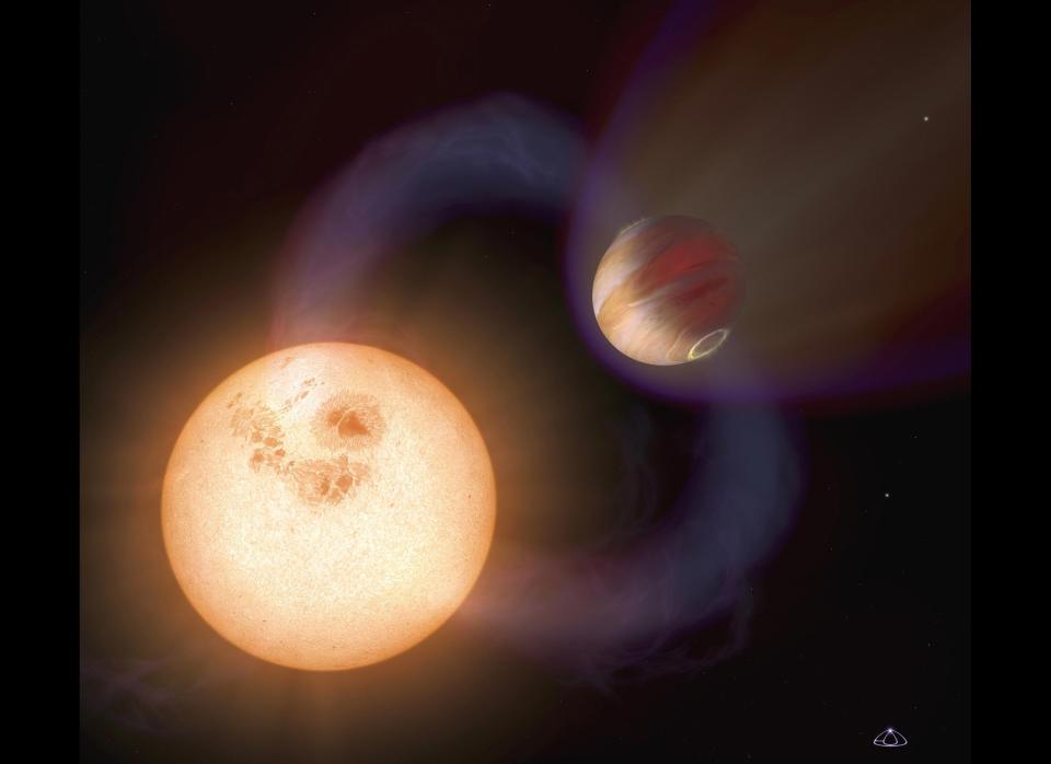 Picture released on Oct. 4, 2006, by the European Space Agency shows an artist's impression of a unique type of exoplanet discovered with the Hubble Space Telescope. This image presents a purely speculative view of what a 'hot Jupiter' (word dedicated to planets so close to their stars with such short orbital periods) might look like. A seam of stars at the center of the Milky Way has shown astronomers that an entirely new class of planets closely orbiting distant suns is waiting to be explored. An international team of astronomers, using a camera aboard NASA's Hubble telescope, delved into a zone of the Milky Way known as the 'galactic bulge,' thus called because it is rich in stars and in the gas and dust which go to make up stars and planets. The finding opens up a new area of investigation for space scientists probing extrasolar planets - planets that orbit stars other than our own.&nbsp;