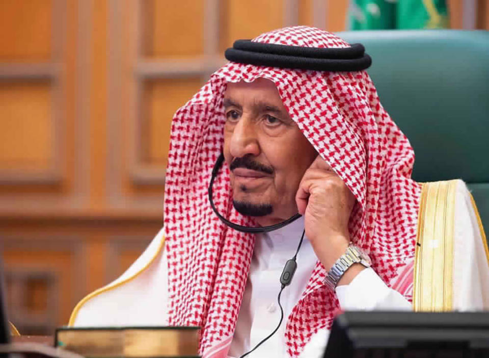 In this photo released by Saudi Press Agency, SPA, Saudi King Salman, chairs a video call of world leaders from the Group of 20 and other international bodies and organizations, from his office in Riyadh, Saudi Arabia, Thursday, March 26, 2020. The online meeting, that lasted about 90 minutes, aimed at coordinating the global response to the fast-spreading coronavirus, which has shuttered businesses and forced well over a quarter of the world's population into home isolation. (Saudi Press Agency via AP)