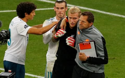 Bale tries to console a distraught Karius at the end - Credit: PHIL NOBLE/REUTERS