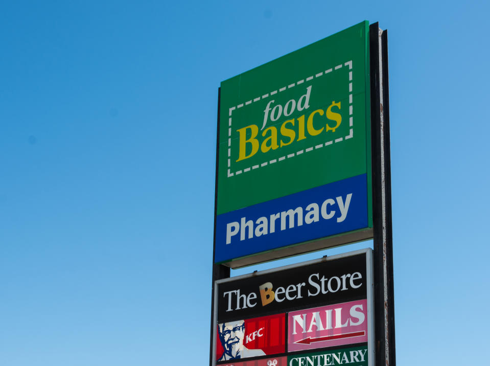 TORONTO, ONTARIO, CANADA - 2015/05/06: Billboard with a different advertisements in a mall square in a day with a blue sky in the background. 

Food Basics is a discount Canadian supermarket chain owned by Metro Inc. with all stores located within Ontario. (Photo by Roberto Machado Noa/LightRocket via Getty Images)