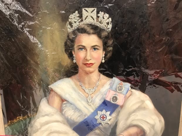 The portrait of a young Queen Elizabeth was taken down from Calgary's council chamber two weeks ago as part of an effort to learn more about the painting. (Scott Dippel/CBC - image credit)