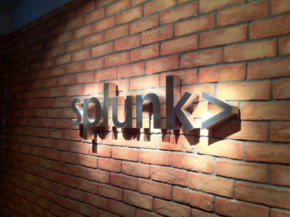 Splunk logo on a brick wall