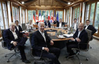 Clockwise from left, British Prime Minister Boris Johnson, Japanese Prime Minister Fumio Kishida, the President of the European Commission Ursula von der Leyen, European Council President Charles Michel, Italian Prime Minister Mario Draghi, Canadian Prime Minister Justin Trudeau, French President Emmanuel Macron, German Chancellor Olaf Scholz and U.S. President Joe Biden attend a working session during of the G7 leaders summit at Castle Elmau in Kruen, near Garmisch-Partenkirchen, Germany, on Tuesday, June 28, 2022. The Group of Seven leading economic powers are meeting in Germany for their annual gathering Sunday through Tuesday. (Benoit Tessier/Pool Photo via AP)