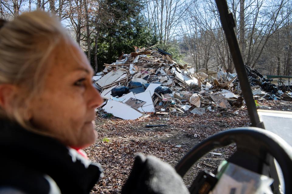 Sherri McArthur has lived for four months surrounded by the debris left by her beloved campers at Laurel Bank Campground along the Pigeon River. "It's affected me so much. I lost four of my favorites ... I still cry," said McArthur, "I still cry every day when I think about it."