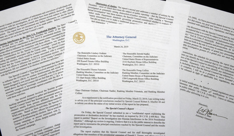 FILE - In this March 24, 2019, file photo, a copy of a letter from Attorney General William Barr advising Congress of the principal conclusions reached by special counsel Robert Mueller, is photographed in Washington. Barr is defending his short summary of special counsel Robert Mueller's report on his Russia investigation. Barr says his summary accurately captured the report's conclusions. (AP Photo/Jon Elswick, File)