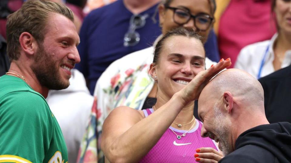 Aryna Sabalenka of Belarus celebrates with her team after defeating Jessica Pegula of the United States