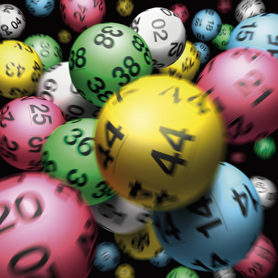 Coloured Lotto balls in a group together. 
