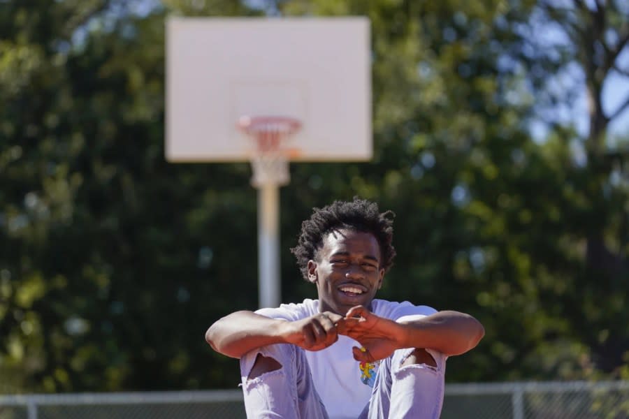 Bryant West poses for a portrait on a basketball court built by NBA star Devin Booker, who went to high school here, in Moss Point, Miss., Friday, Oct. 20, 2023. (AP Photo/Gerald Herbert)