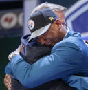 Ohio State outside linebacker Ryan Shazier hugs NFL commissioner Roger Goodell after being selected by the Pittsburgh Steelers as the 15th pick in the first round of the 2014 NFL Draft, Thursday, May 8, 2014, in New York. (AP Photo/Craig Ruttle)