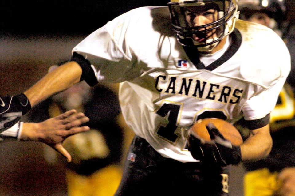 Biglerville's Joey Wagner runs the ball up field for a touchdown during their game at Delone Catholic on October 8, 2004.