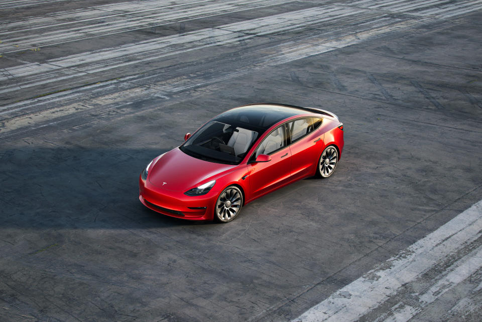 This undated photo provided by Tesla shows the 2021Tesla Model 3, which is the Edmunds Top Rated EV for 2021. It offers tremendous range, a robust charging network and a high-tech feel. (Courtesy of Tesla Motors via AP)