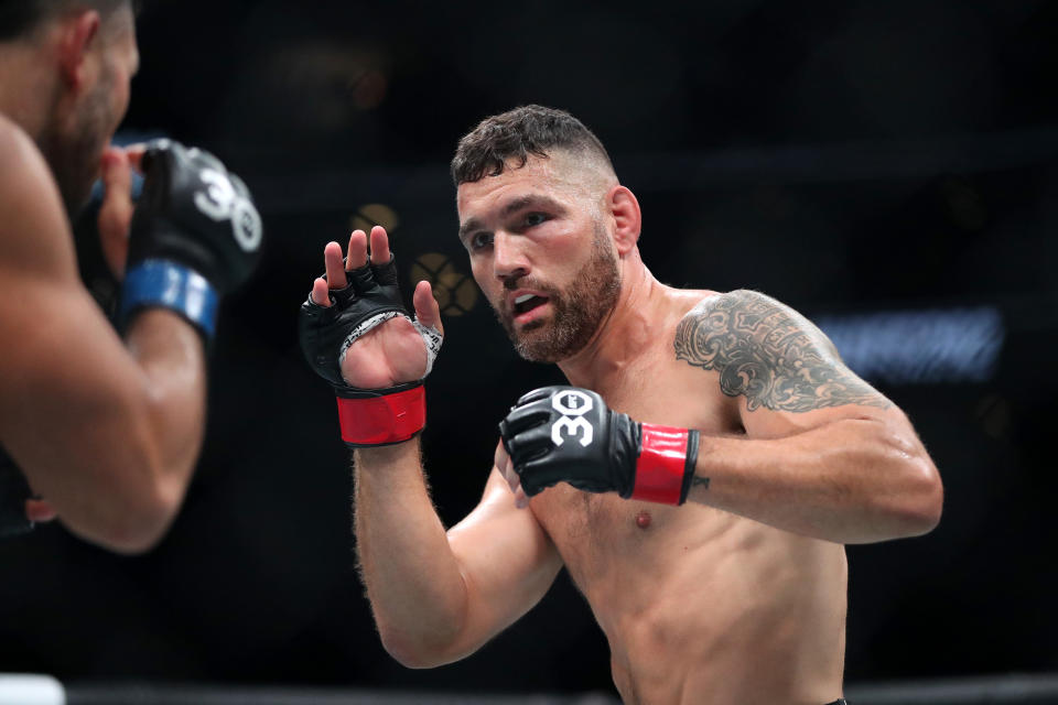 BOSTON, MASSACHUSETTS – AUGUST 19: Chris Weidman faces off with Brad Tavares during their Middleweight bout at UFC 292 at TD Garden on August 19, 2023 in Boston, Massachusetts. (Photo by Paul Rutherford/Getty Images)